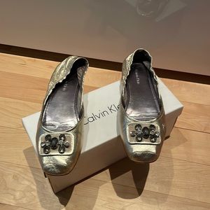 Calvin Klein gold flats